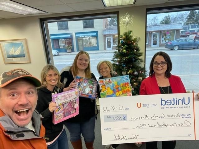 The Bridgman Branch in Michigan donated money and toys to Harbor County Mission